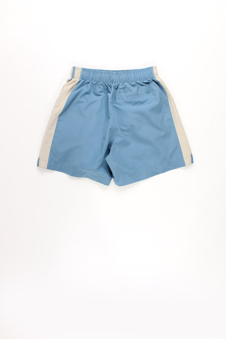 00's Nike blue and tan sports shorts featuring an elasticated waistband, inter webbing  ,drawstring waist and swoosh logo on the leg.