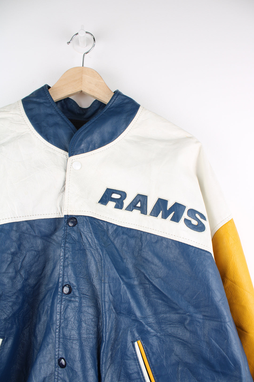 Vintage 90's St. Louis (now Los Angeles) Rams NFL leather varsity/ bomber jacket.