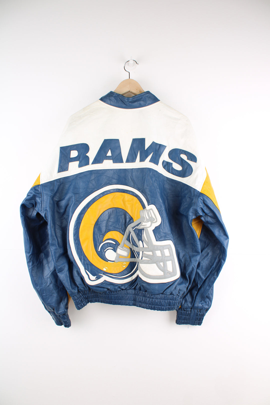 Vintage 90's St. Louis (now Los Angeles) Rams NFL leather varsity/ bomber jacket.