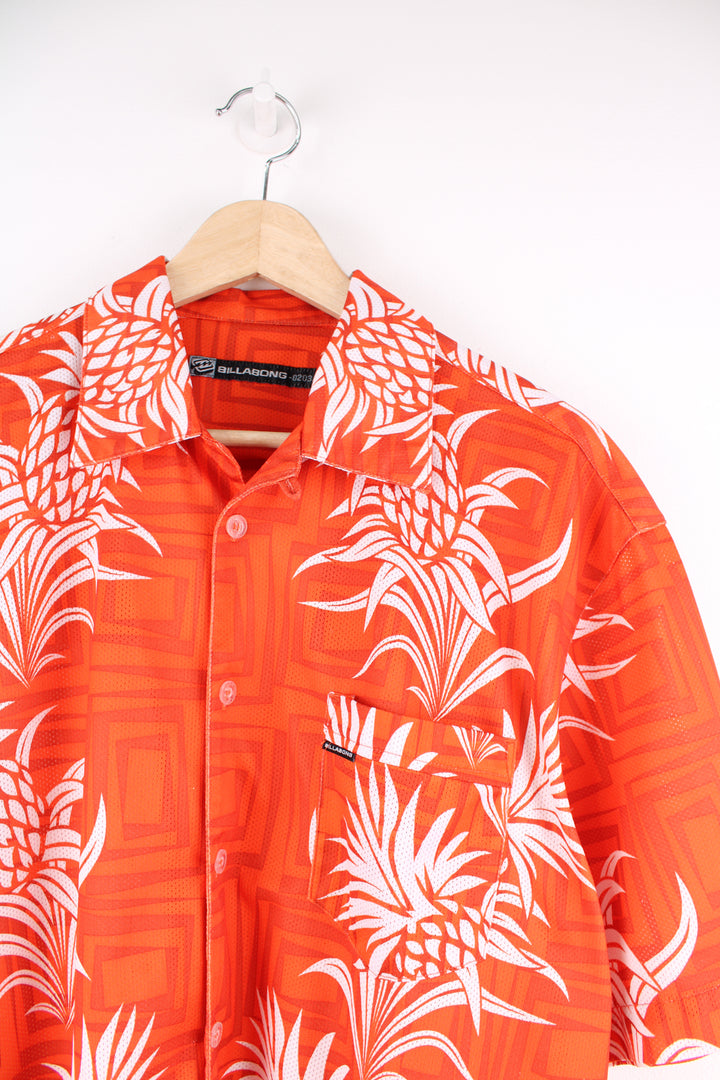 Billabong Hawaiian Shirt in a orange and white colourway, floral pattern design printed all over, button up and has a chest pocket.