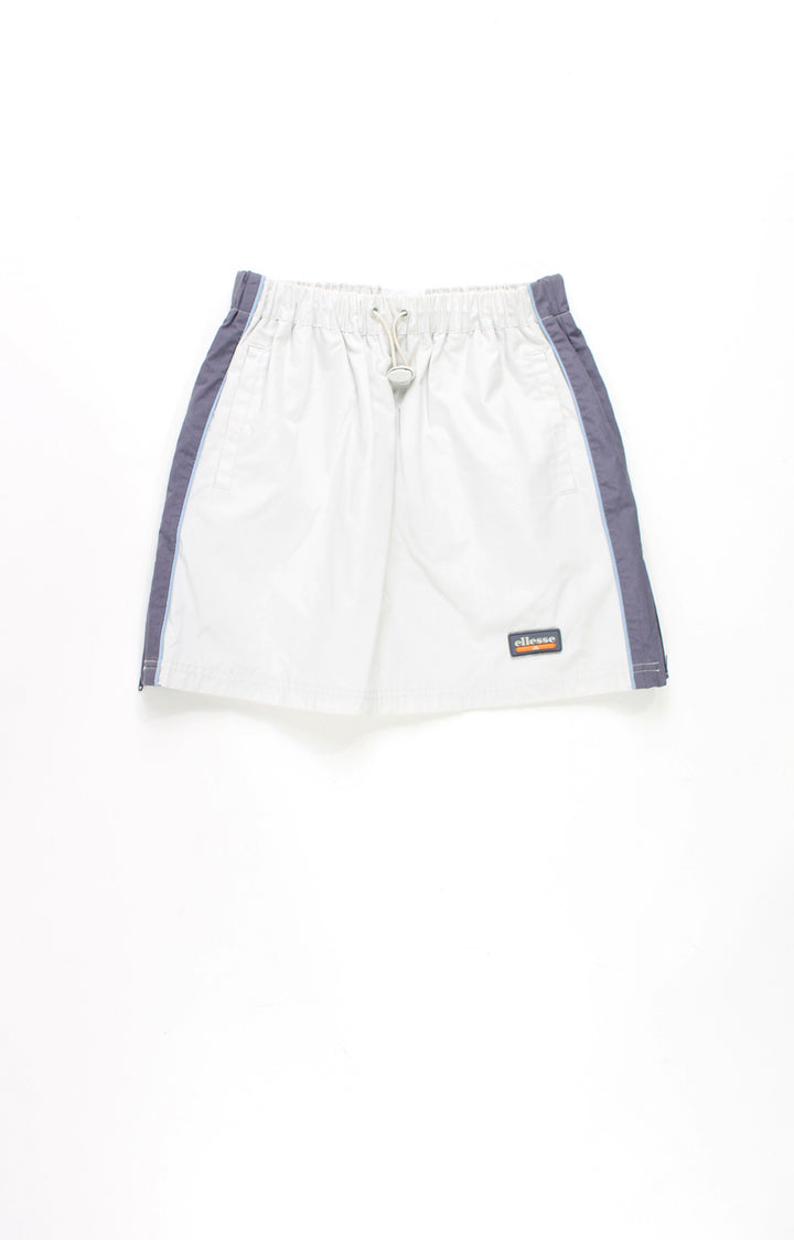 Ellesse light grey and blue sporty style mini skirt, with elasticated drawstring waist, 3D logo on the hem and adjustable zips on the sides 