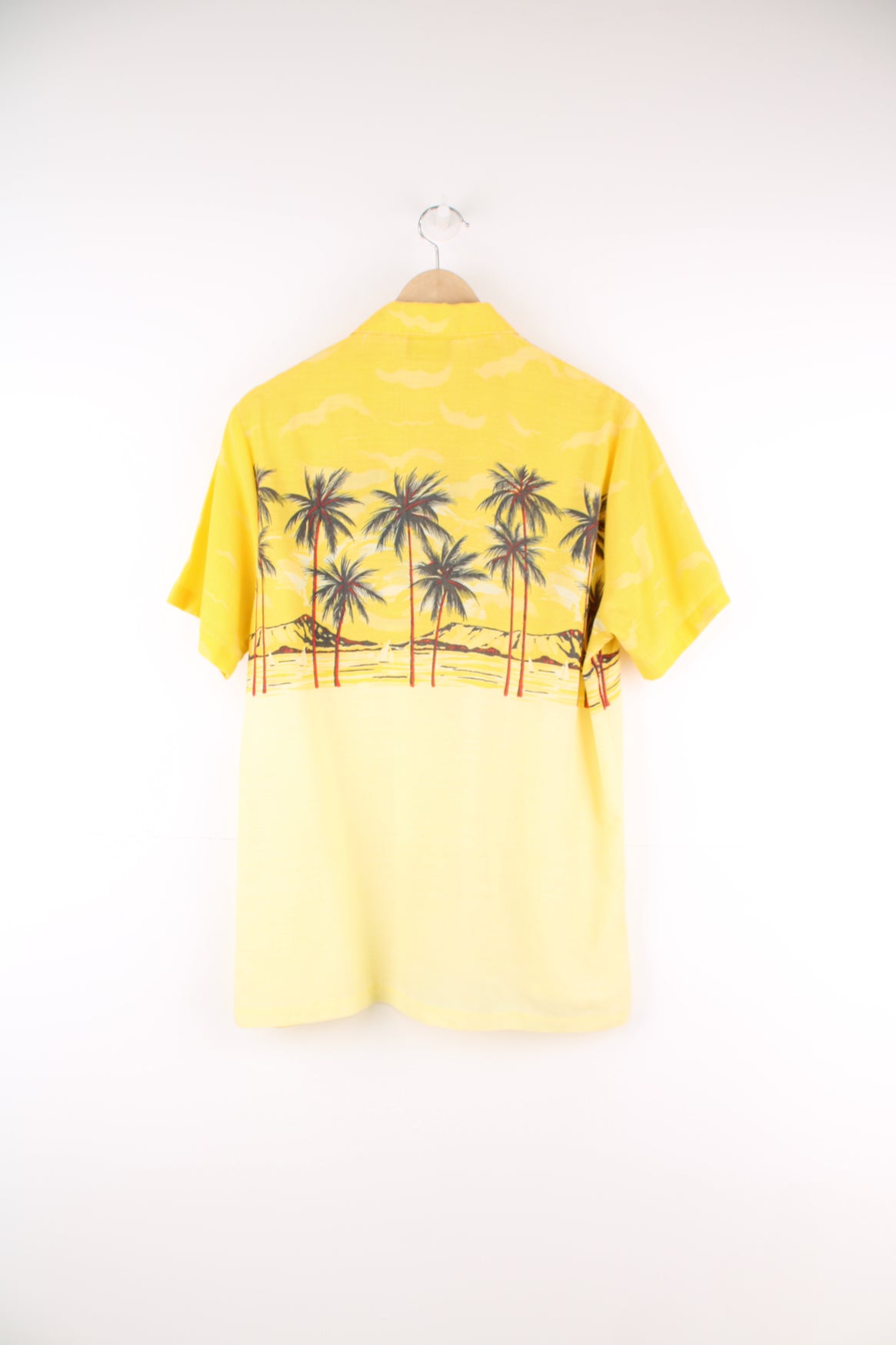 Vintage Hawaiian Shirt in a yellow colourway, palm tree island design printed on the front and back, button up and has a camp collar.