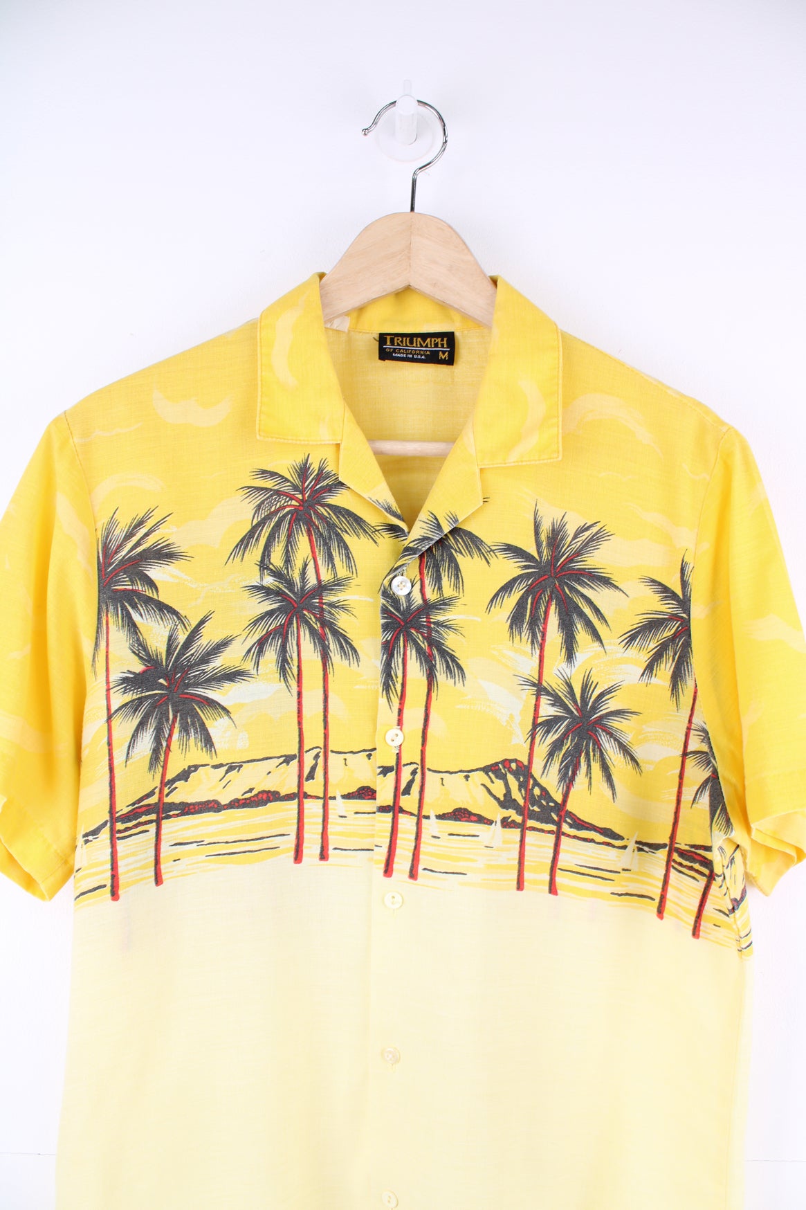 Vintage Hawaiian Shirt in a yellow colourway, palm tree island design printed on the front and back, button up and has a camp collar.