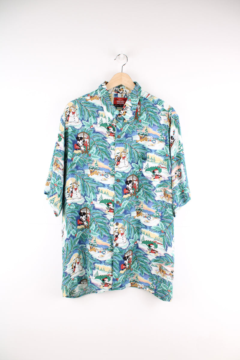 Vintage 90's Reyn Spooner, Mickey Mouse Disney Christmas Shirt in a green colourway, cartoon and Christmas print all over, button up and has a chest pocket.