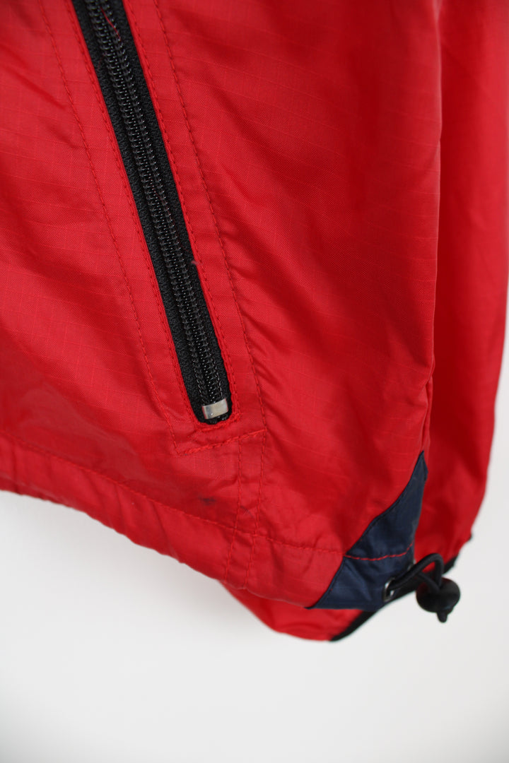 Helly Hansen red 1/4 zip windbreaker jacket with embroidered logo on the chest