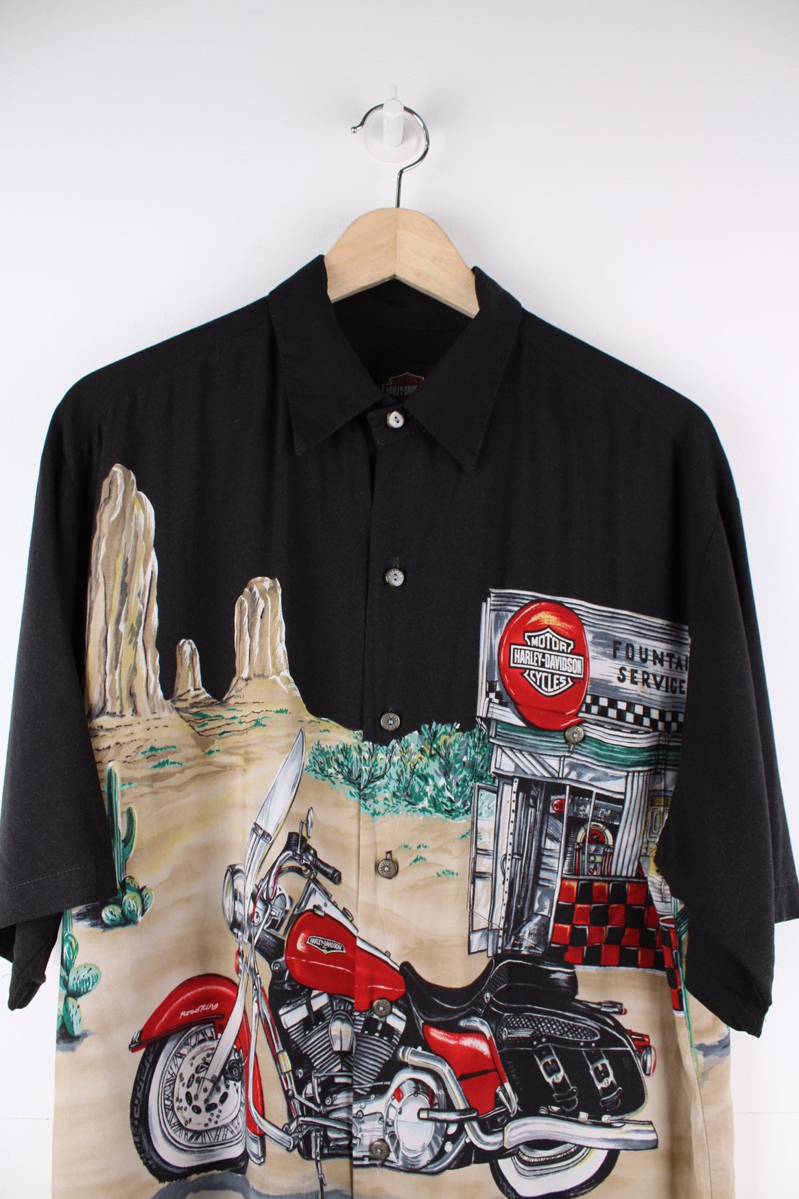 Harley Davidson Hawaiian Shirt in a black colourway with a motorbike design printed all over, button up and has a chest pocket.