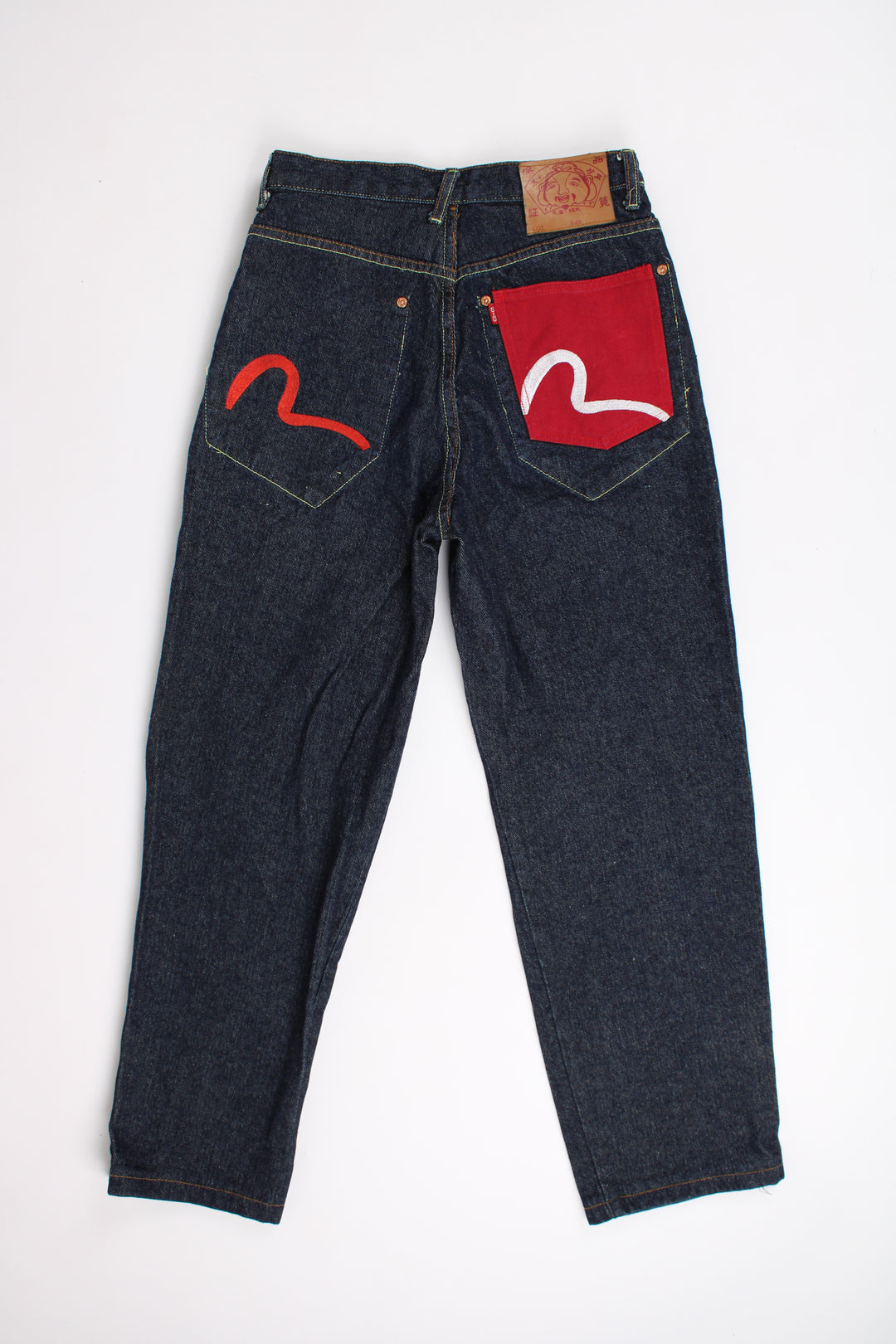 Evisu blue dark wash high waisted denim jeans with red motif embroidered back pockets