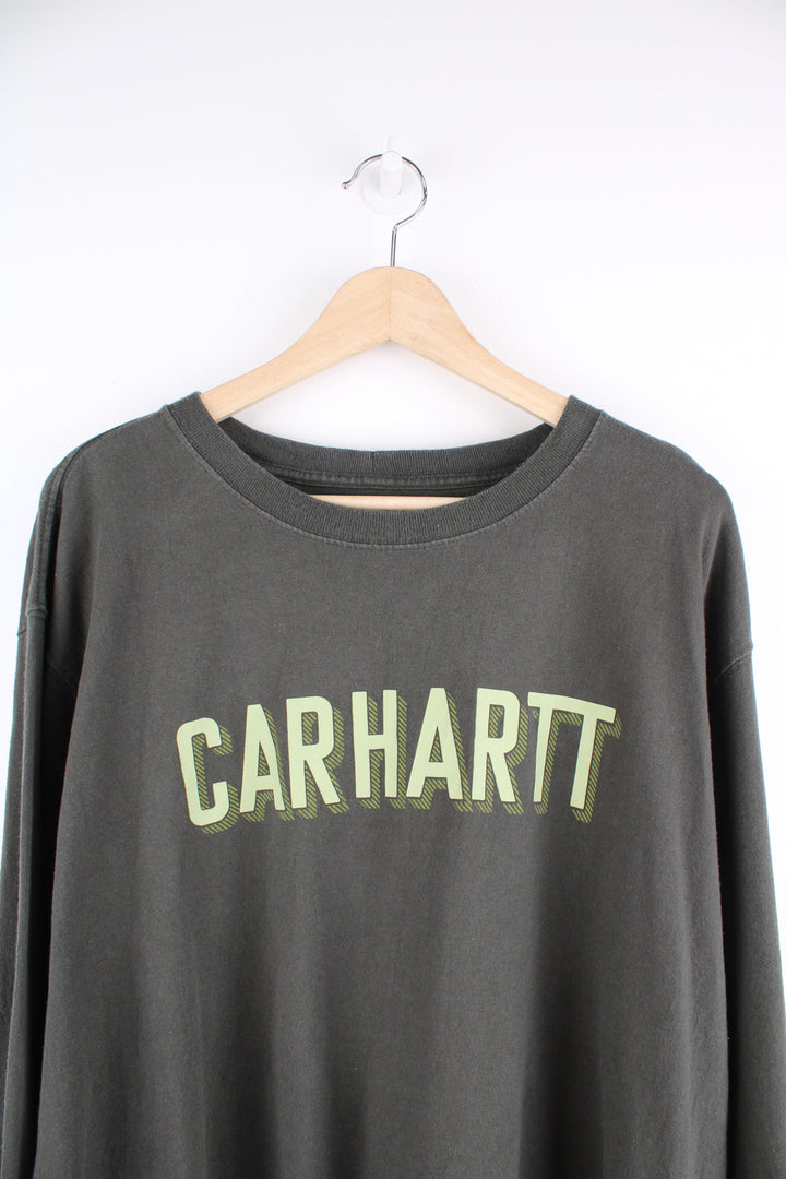 Carhartt khaki green relaxed fit long sleeve top with spell-out logo across the chest