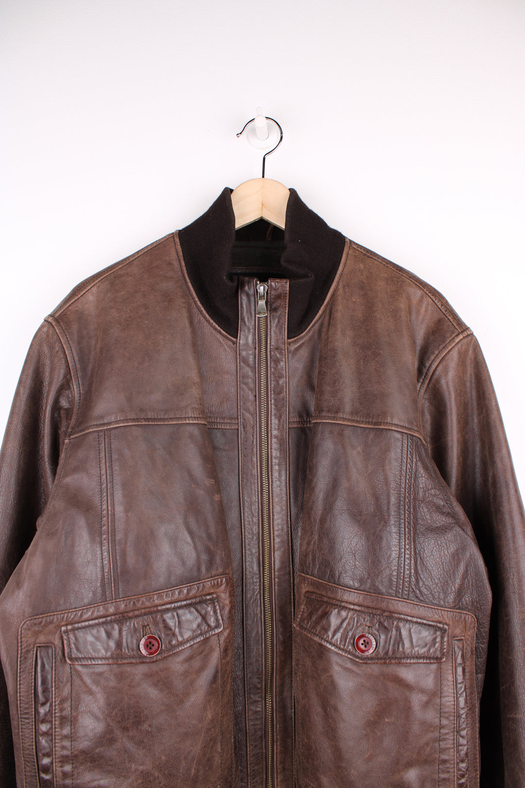 Vintage CAT brown, leather bomber jacket. Features elasticated cuffs/ waistband and closes with a full zip.  Good condition - Some scuffs and scratches to the leather (see photos) Size in Label  Mens XL