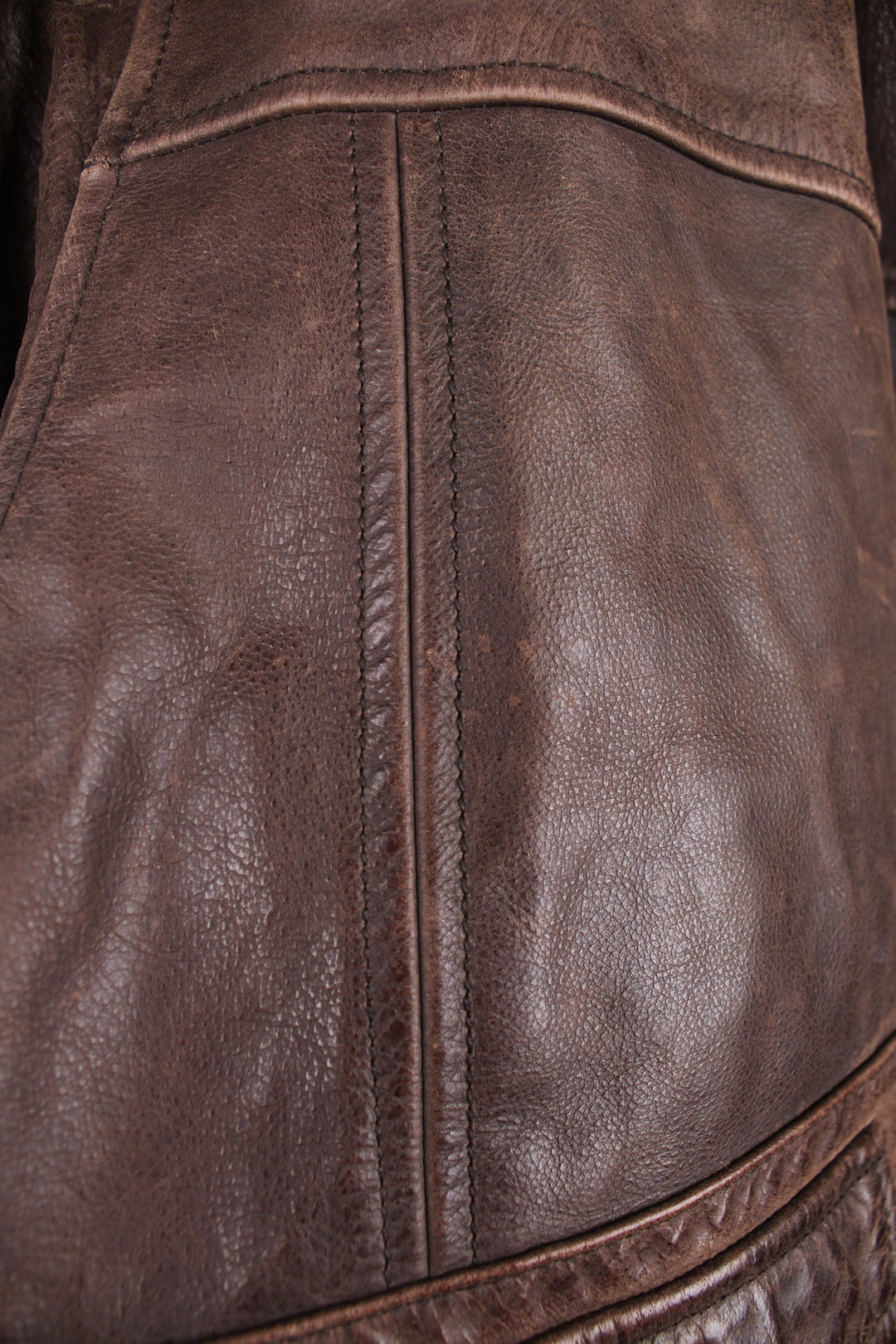 Vintage CAT brown, leather bomber jacket. Features elasticated cuffs/ waistband and closes with a full zip.  Good condition - Some scuffs and scratches to the leather (see photos) Size in Label  Mens XL