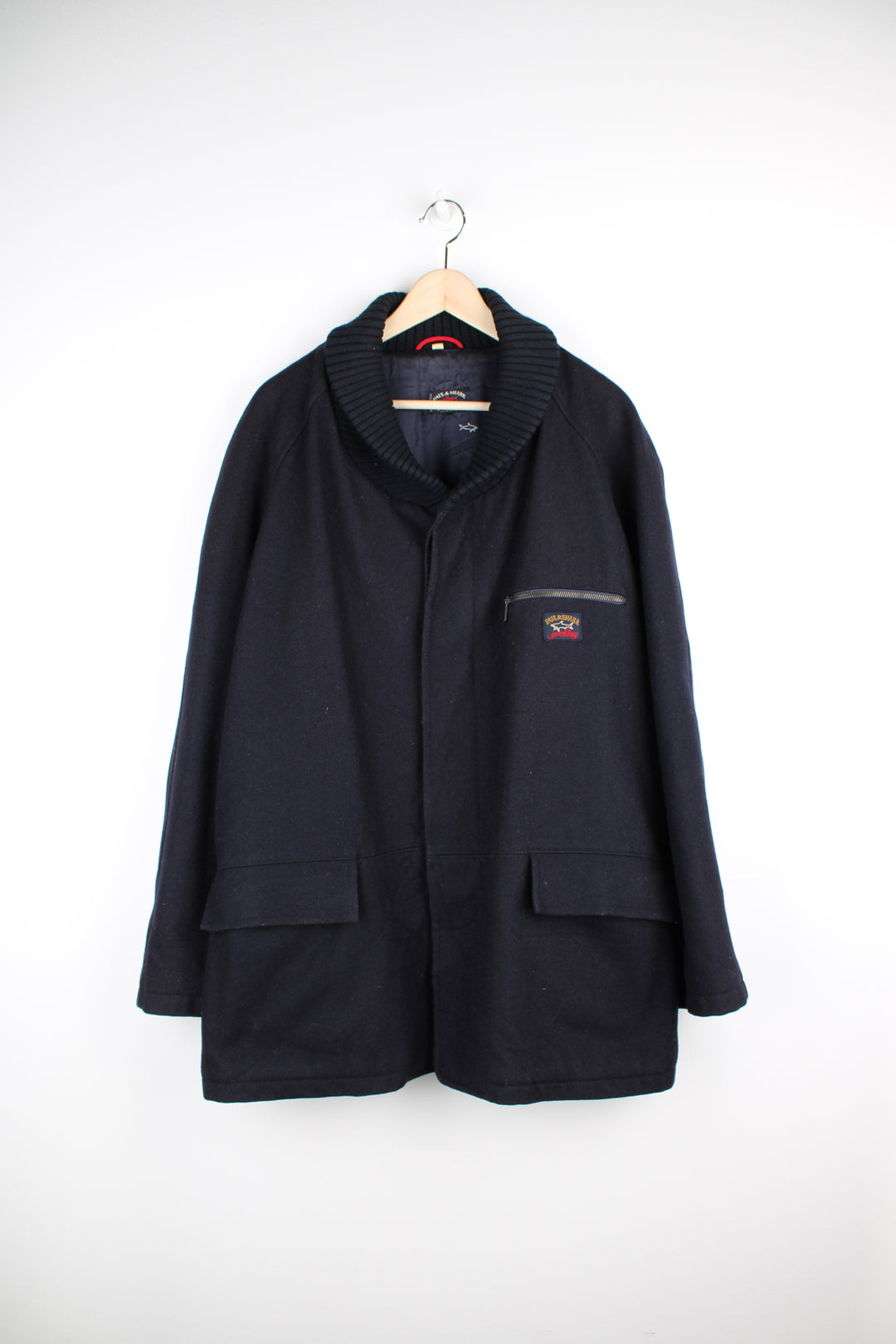 Vintage Paul & Shark navy blue wool jacket. Features embroidered logo on the chest and closes with buttons down the front. good condition Size in Label Mens XL