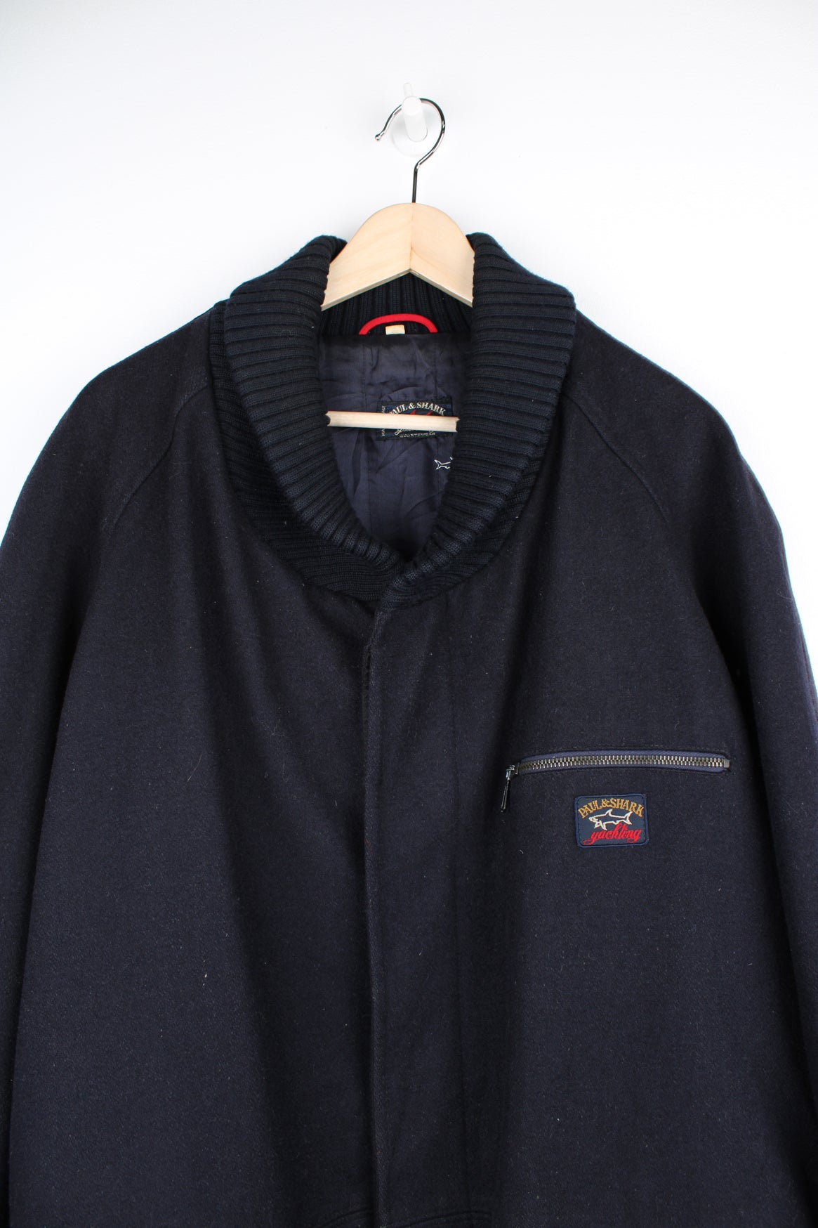 Vintage Paul & Shark navy blue wool jacket. Features embroidered logo on the chest and closes with buttons down the front. good condition Size in Label Mens XL