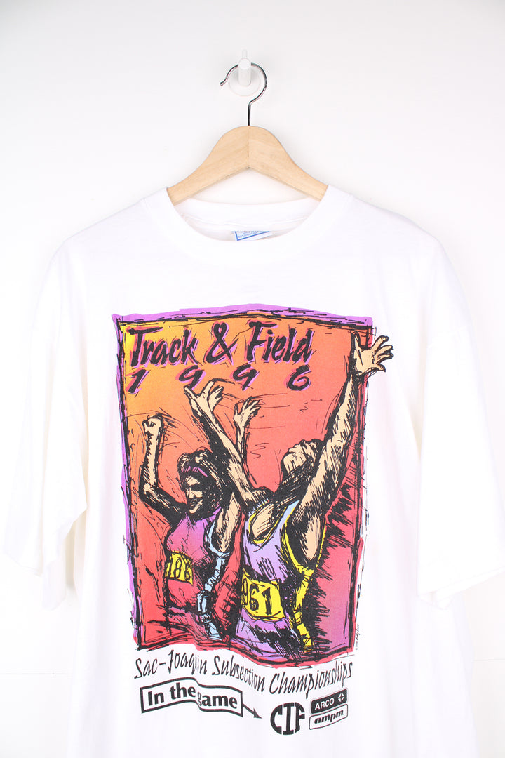 Vintage 1996 Track and Field single stitch tee in white by All Sport Proweight features printed graphic by Billy Tees on the front