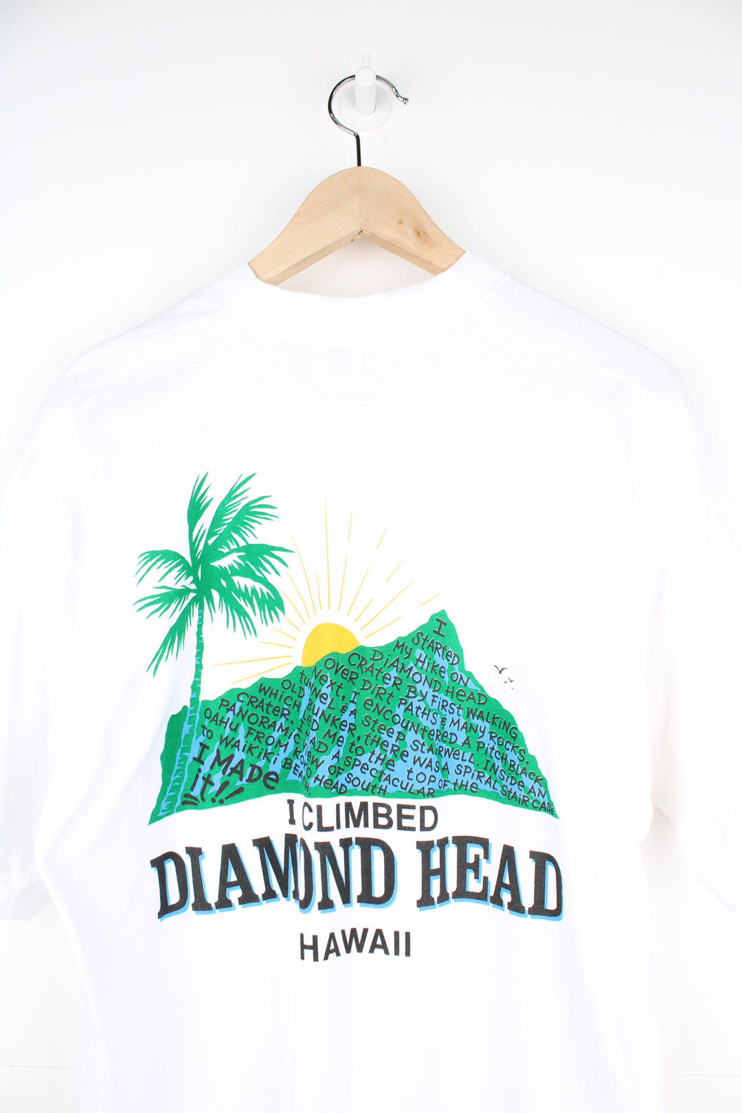 Vintage made in the USA 90's single stitch t-shirt in white by Fruit of Loom, features printed 'I climbed Diamond Head Mountain' graphic on the front and back  