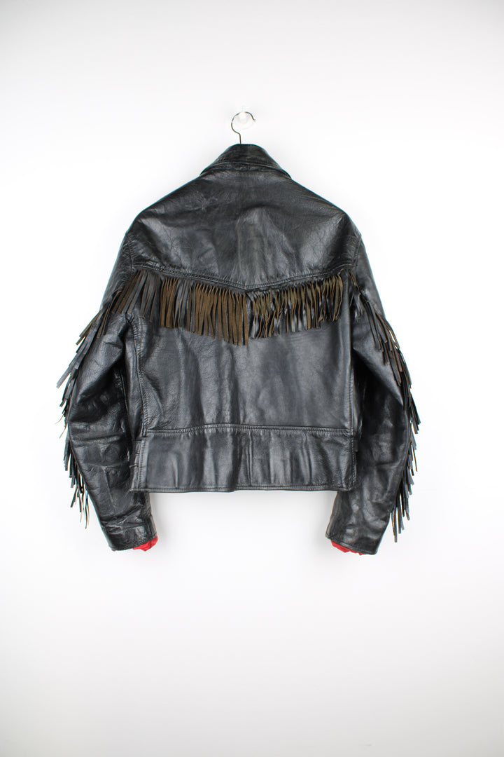 Vintage 60's Fieldsheer Leathers Long Horn fringe motorcycle jacket. Black leather jacket with red lining, silver hardware and buckle detail on the waist.  good condition - some wear to the leather and silver hardware in places, a small rip on the back of the jacket has been repaired (see photos).   Size in Label:  Mens 44 - Measures like a mens L  Shown on a womens size 12 (oversized fit)