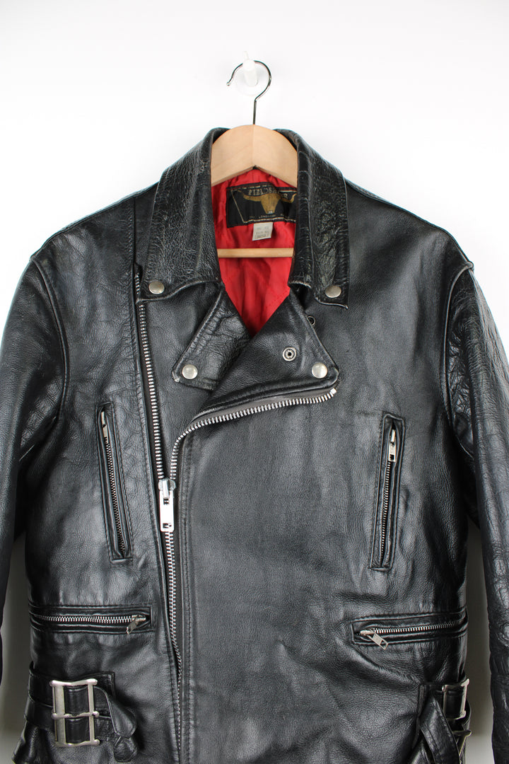 Vintage 60's Fieldsheer Leathers Long Horn fringe motorcycle jacket. Black leather jacket with red lining, silver hardware and buckle detail on the waist.  good condition - some wear to the leather and silver hardware in places, a small rip on the back of the jacket has been repaired (see photos).   Size in Label:  Mens 44 - Measures like a mens L  Shown on a womens size 12 (oversized fit)