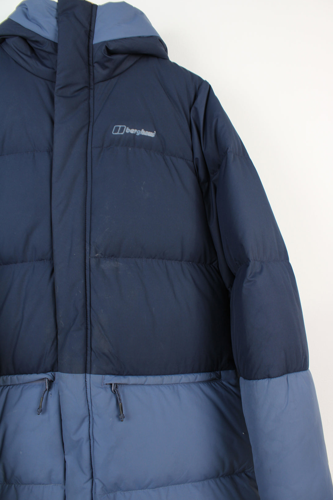 Women's Berghaus blue tone, duck down puffer coat with double pockets and logo on the chest 