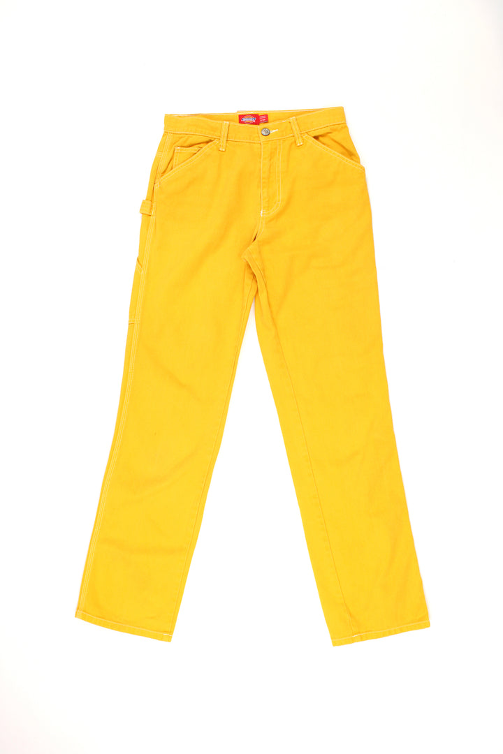 Dickies bright yellow carpenter style jeans with multiple pockets and white contrast stitching