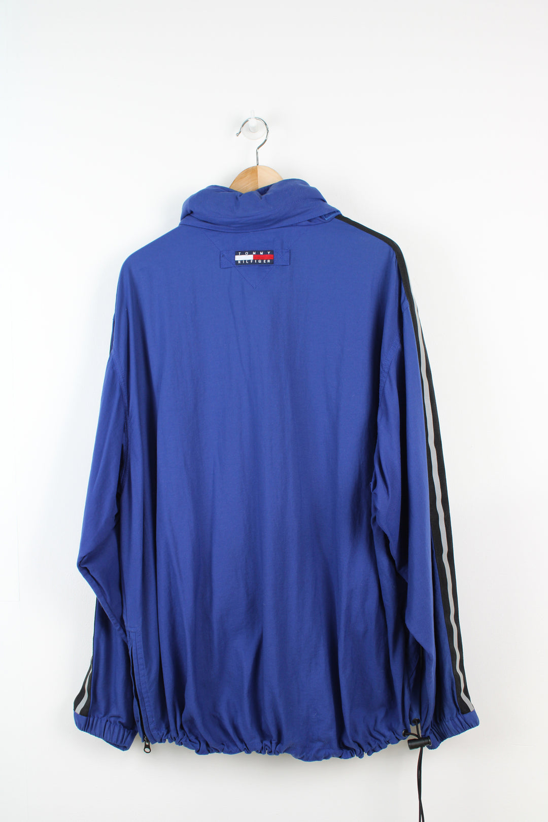 Tommy Hilfiger 1/4 zip windbreaker / lightweight foldaway jacket with embroidered logo on the chest