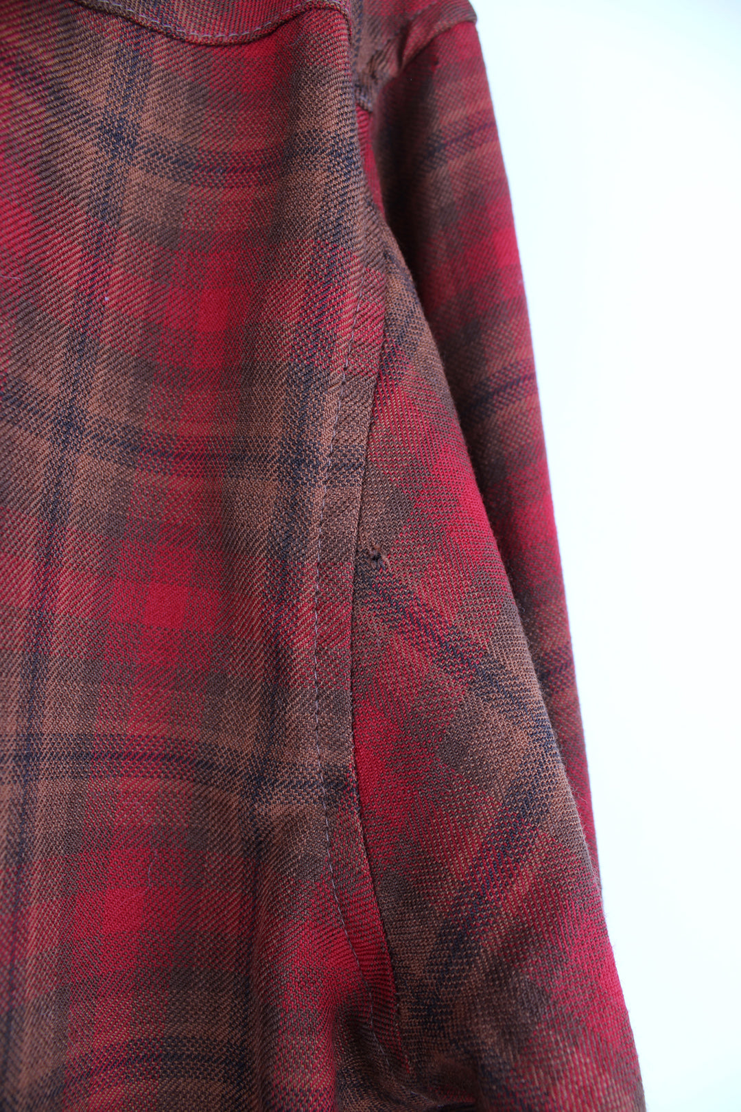 Pendleton 100% wool red/brown plaid shirt with pearl snap buttons and western yoke on the front and back 