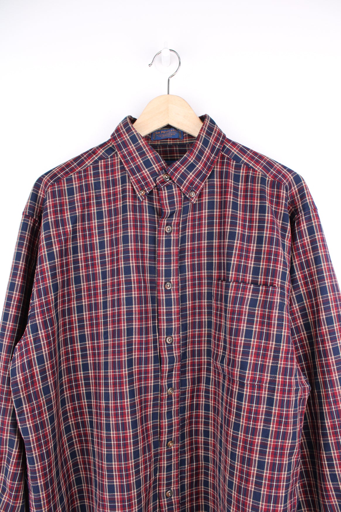 Pendleton 100% wool button up plaid shirt in red/blue features chest pocket 