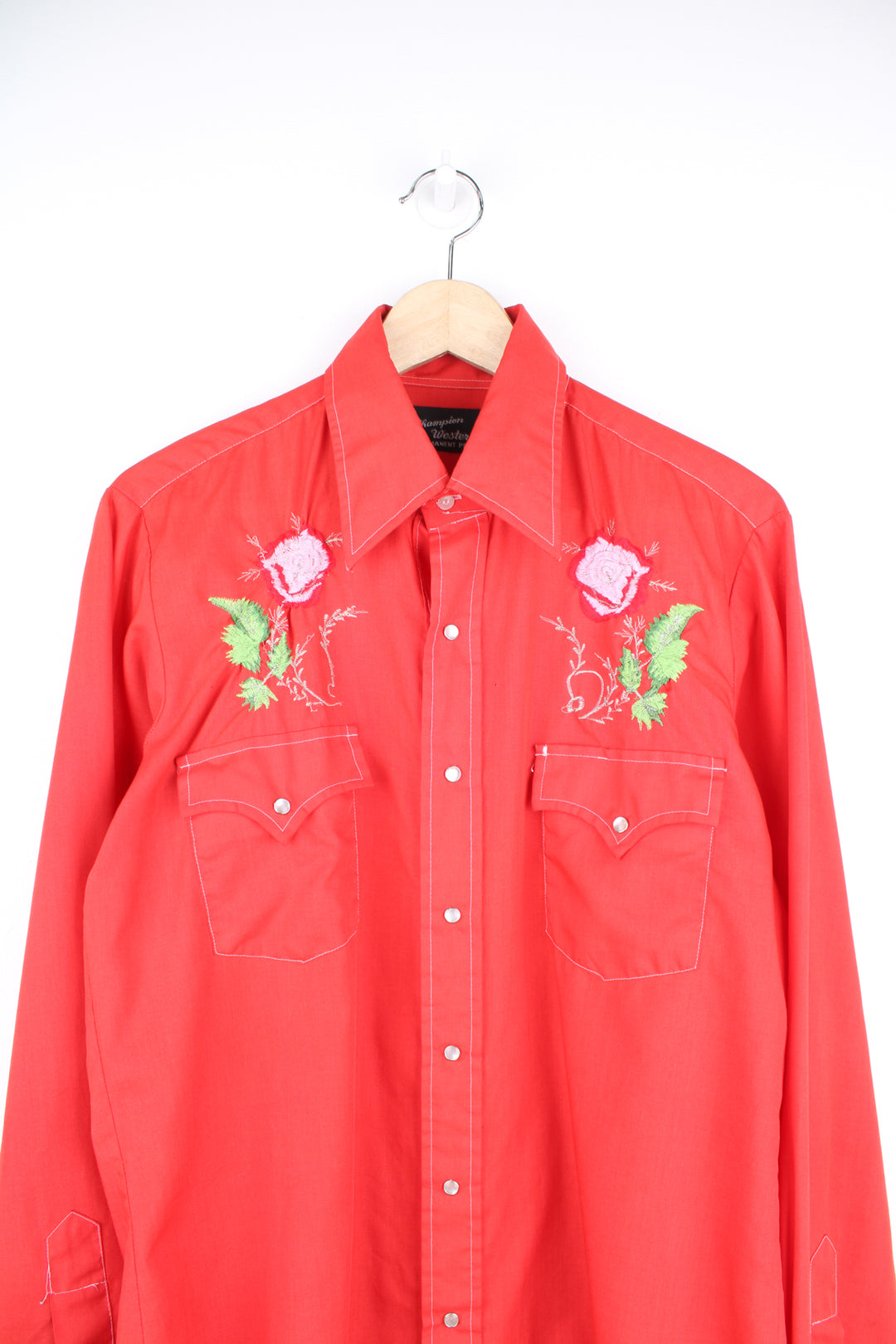 Vintage 70's/80's Champion Westerns all red western shirt, features embroidered roses , pearl snap buttons and yoke on the front and back 