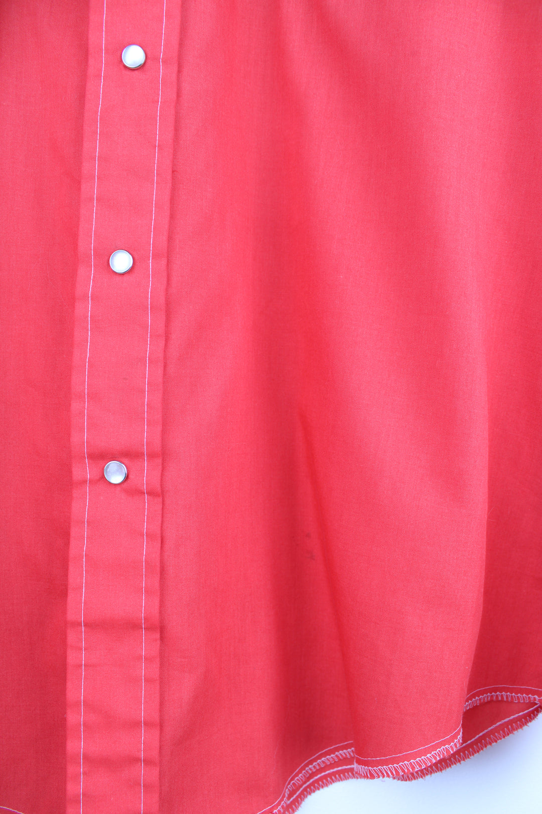 Vintage 70's/80's Champion Westerns all red western shirt, features embroidered roses , pearl snap buttons and yoke on the front and back 