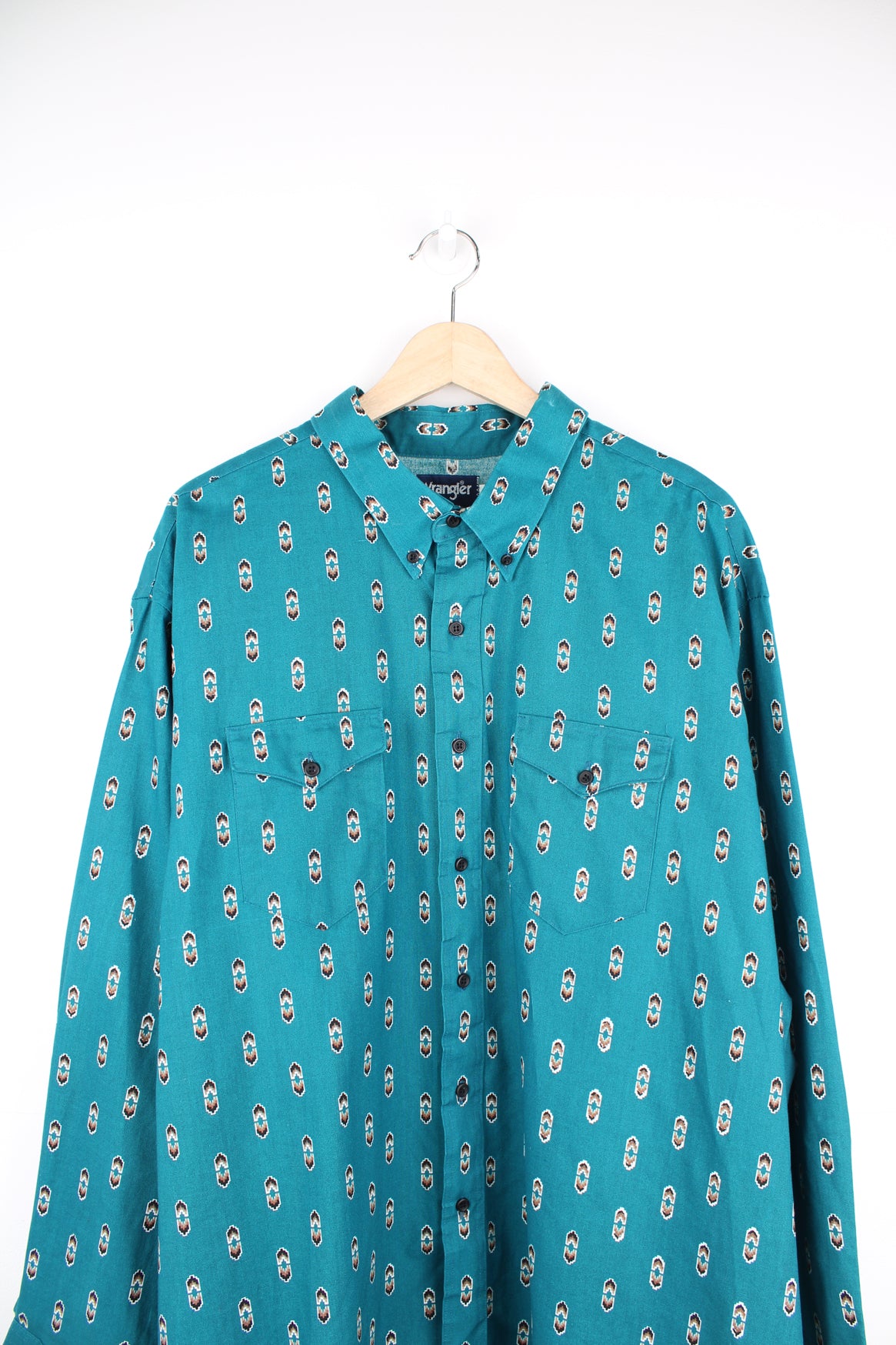 Vintage Wrangler button up shirt in teal blue/green, features all over western style print and yoke on the back