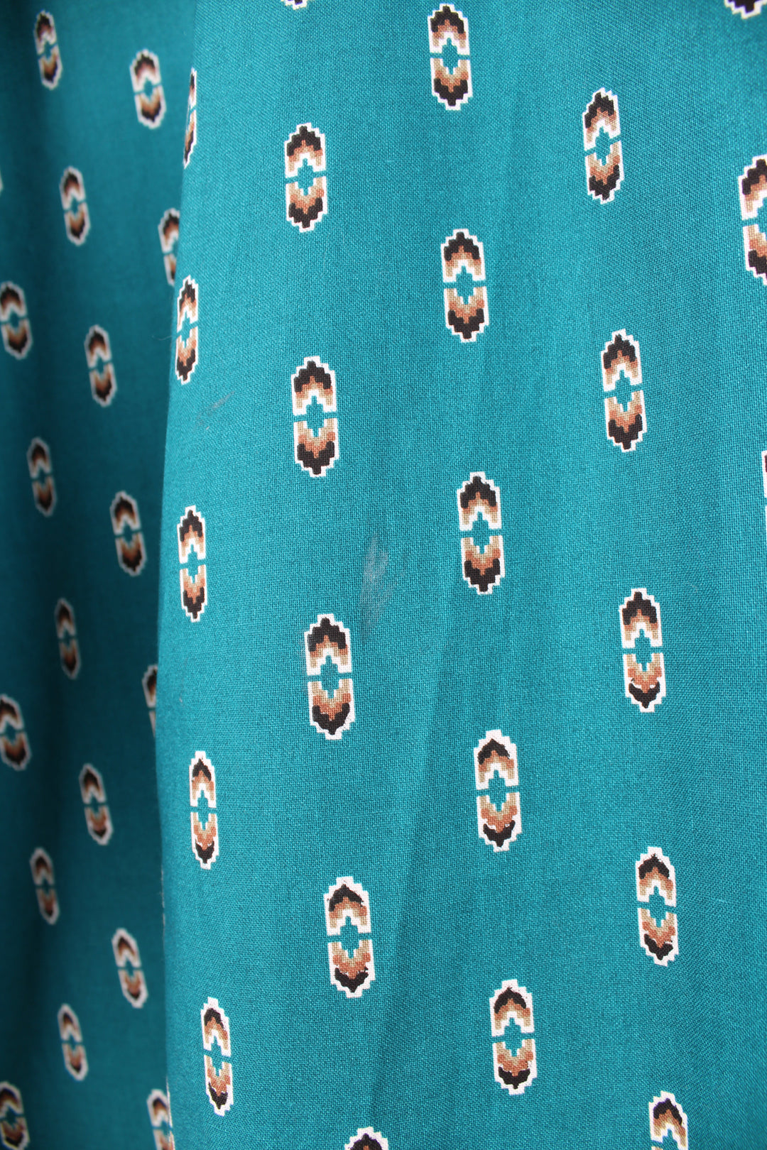 Vintage Wrangler button up shirt in teal blue/green, features all over western style print and yoke on the back