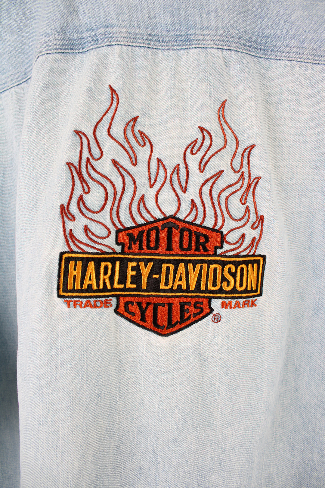 Harley-Davidson light blue denim button up shirt with embroidered spell-out logo on the chest