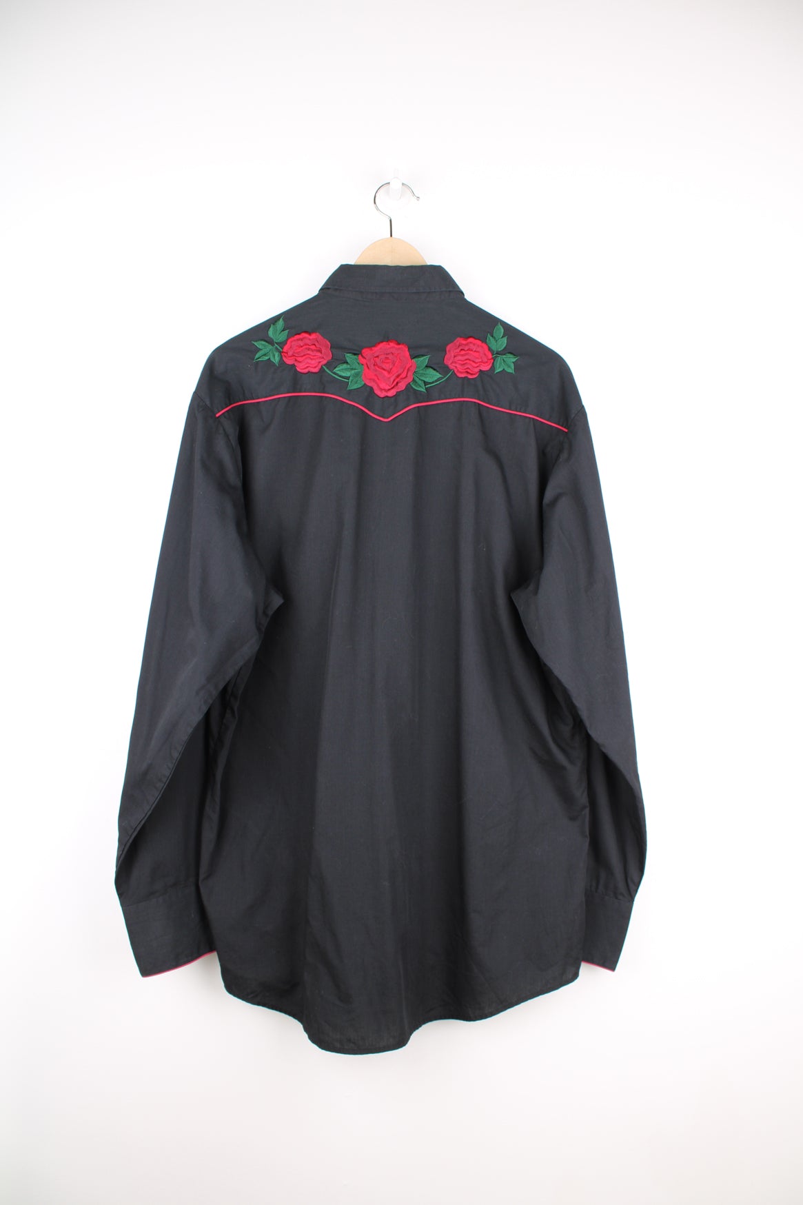 Vintage western shirt by Roper, features embroidered roses, red piping, smile pockets, dagger collar and snap buttons