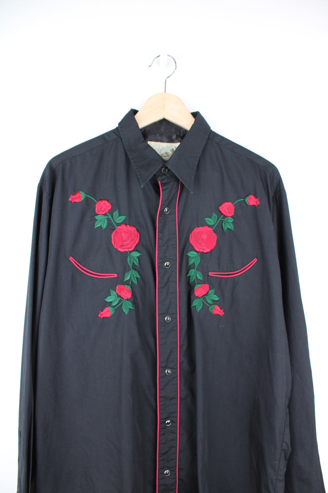 Vintage western shirt by Roper, features embroidered roses, red piping, smile pockets, dagger collar and snap buttons