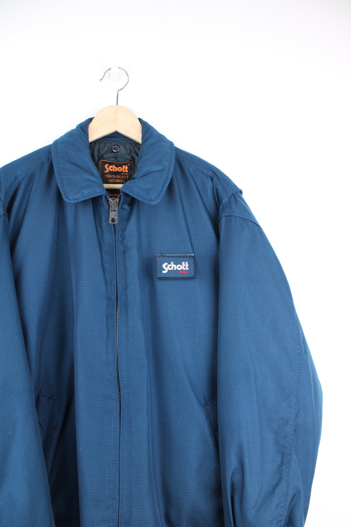 Vintage navy Schott zip through, insulated bomber/flyer jacket with embroidered removable logo on the chest