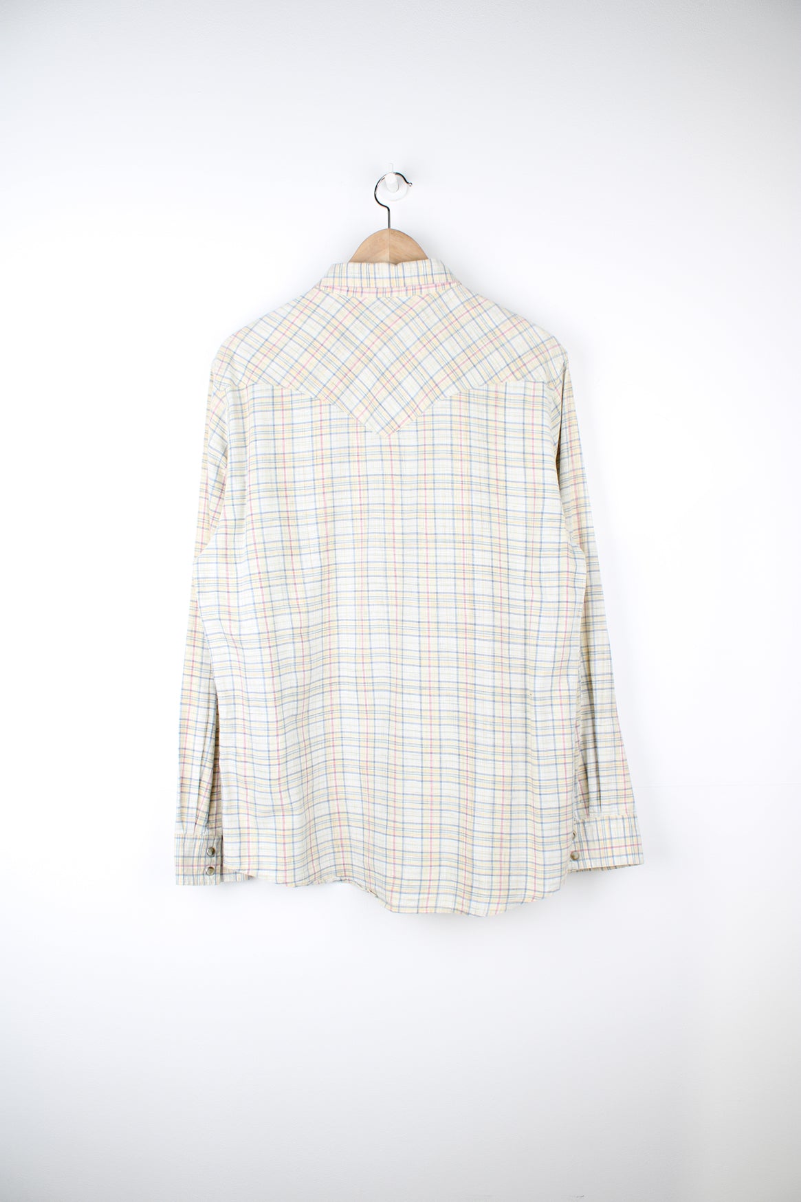 Pendleton pale yellow, plaid button up shirt. Made from 100% cotton, features western style yoke and pearl effect popper buttons