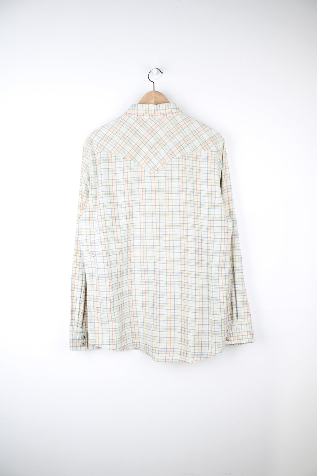 Pendleton pale yellow, plaid button up shirt. Made from 100% cotton, features western style yoke and pearl effect popper buttons