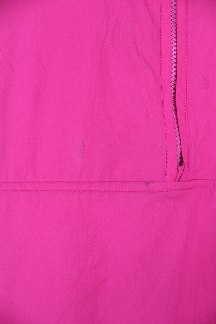 Patagonia Reversible Fleece in either a purple or pink colourway with a fleece or shell option, half zip, pockets and has the logo embroidered on the front.