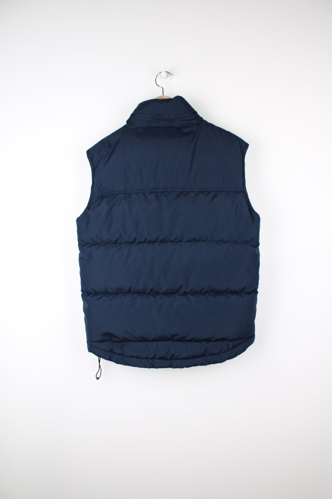 2000s navy blue Nike zip through puffer gilet, with swoosh embroidered logo on the front and foldaway hood