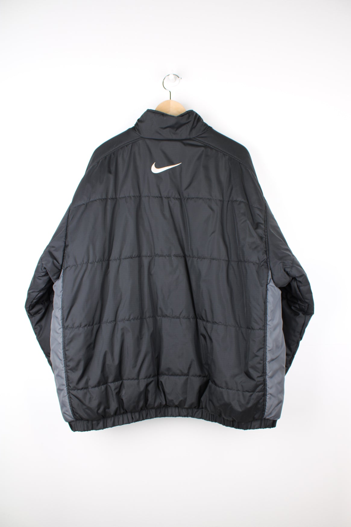 Nike short padded jacket with branded waistband on sale