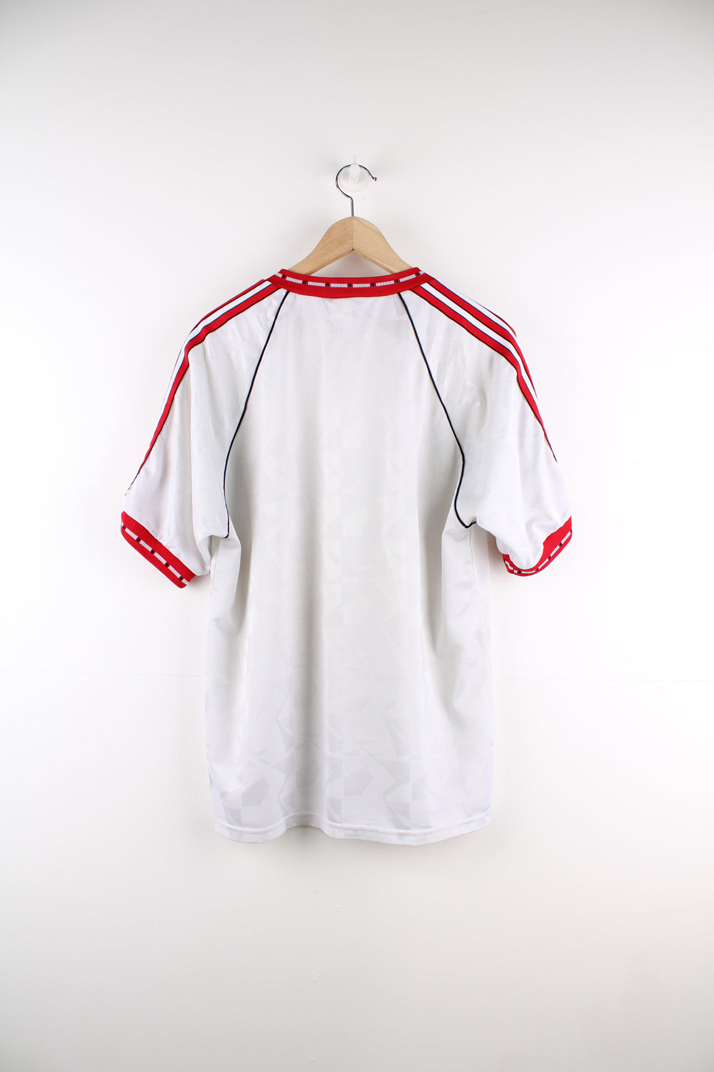 Vintage Adidas, Manchester United 1991 European Cup Winners Shirt in a white and red colourway, and has the logos printed on the front.