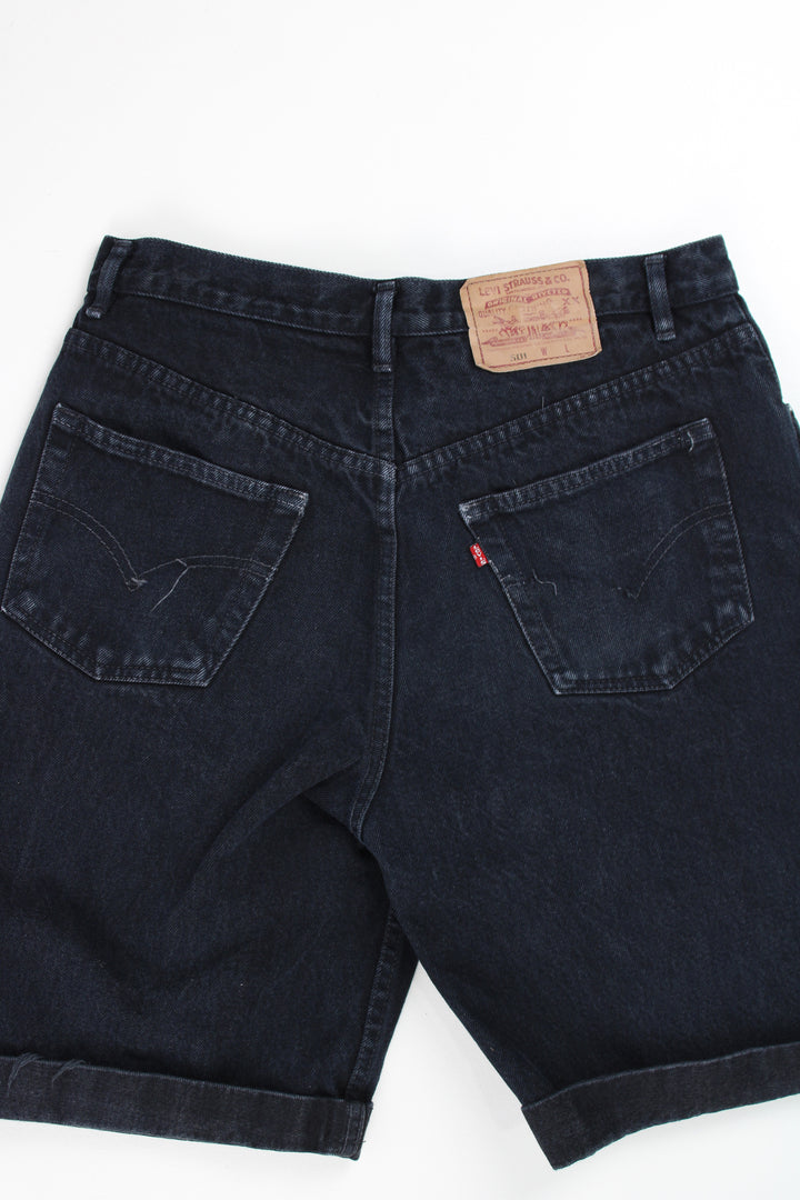 Levi's black denim jorts with embroidered logo on the waist band and details on the pocket