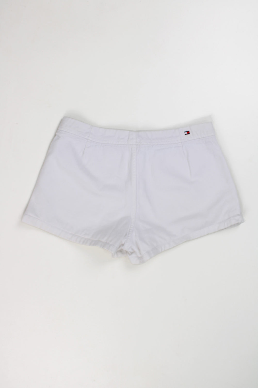 Tommy Hilfiger white denim fashion shorts, with signature embroidered flag on the waistband