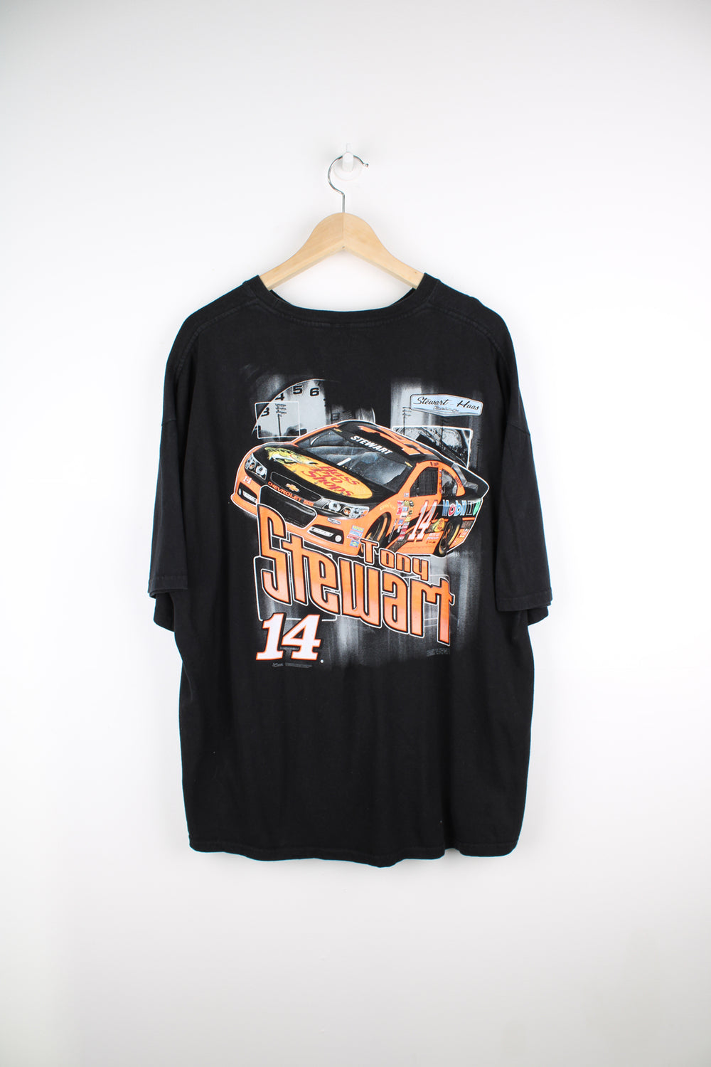 Modern Chase Authentics/ Tony Stewart NASCAR racing t-shirt. Features printed design on the front and back.  good condition Size in Label: Mens XXL