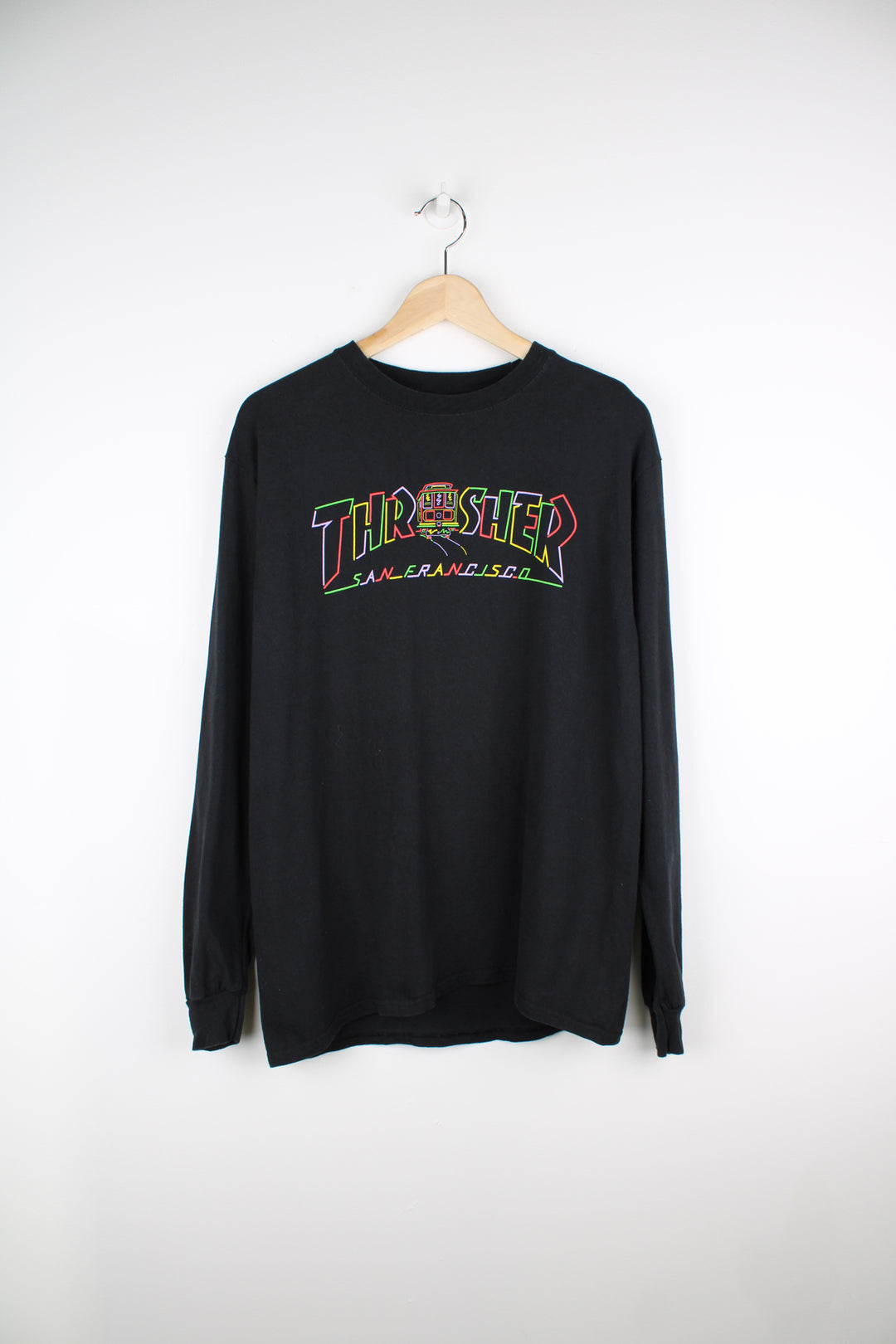 Vintage Thrasher Magazine black spell-out t-shirt. Features long sleeves and rainbow "San Francisco" graphic. good condition Size in Label: Mens M 