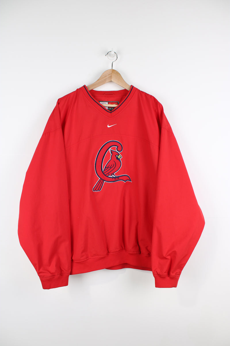 Vintage St Louis all red training top/pullover by Nike. Features large embroidered Cardinal's logo on the front and pockets