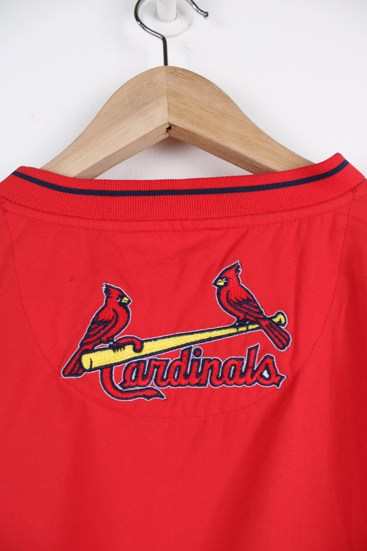 Vintage St Louis all red training top/pullover by Nike. Features large embroidered Cardinal's logo on the front and pockets