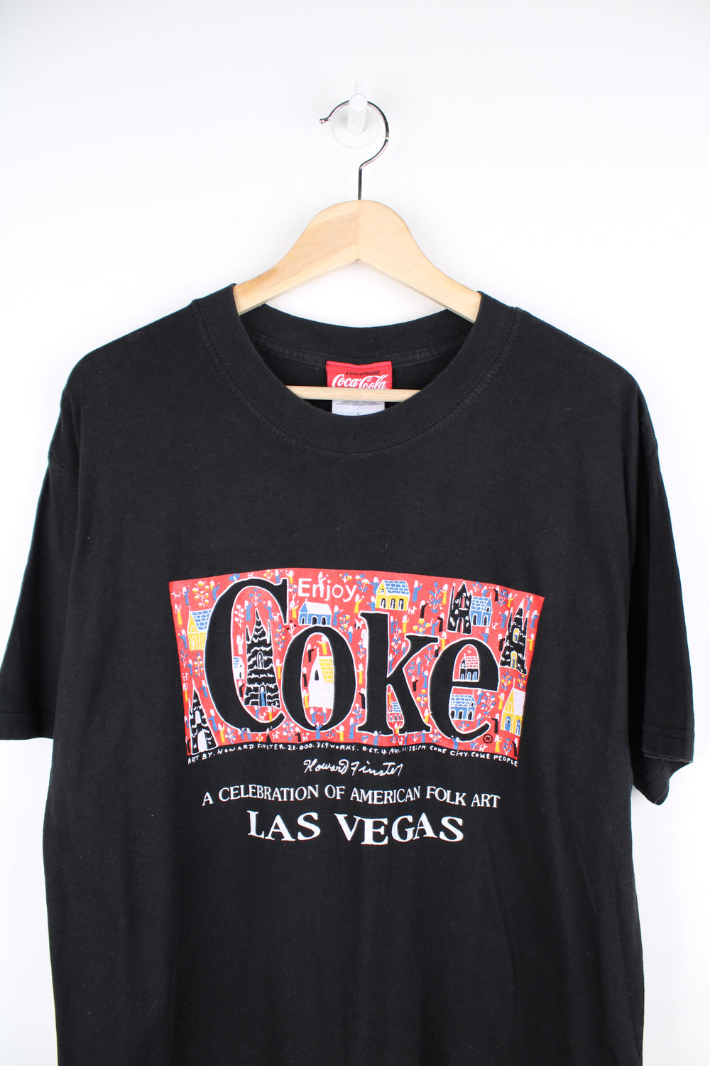 Vintage 90's Coca - Cola black t-shirt with printed Howard Finster "American Folk Art Las Vegas" graphic on the front good condition Size in Label:  Mens L