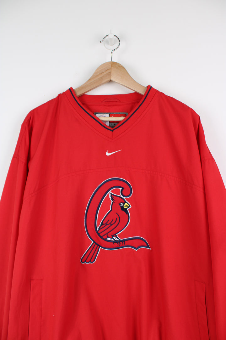 Vintage St Louis all red training top/pullover by Nike. Features large embroidered Cardinal's logo on the front and pockets