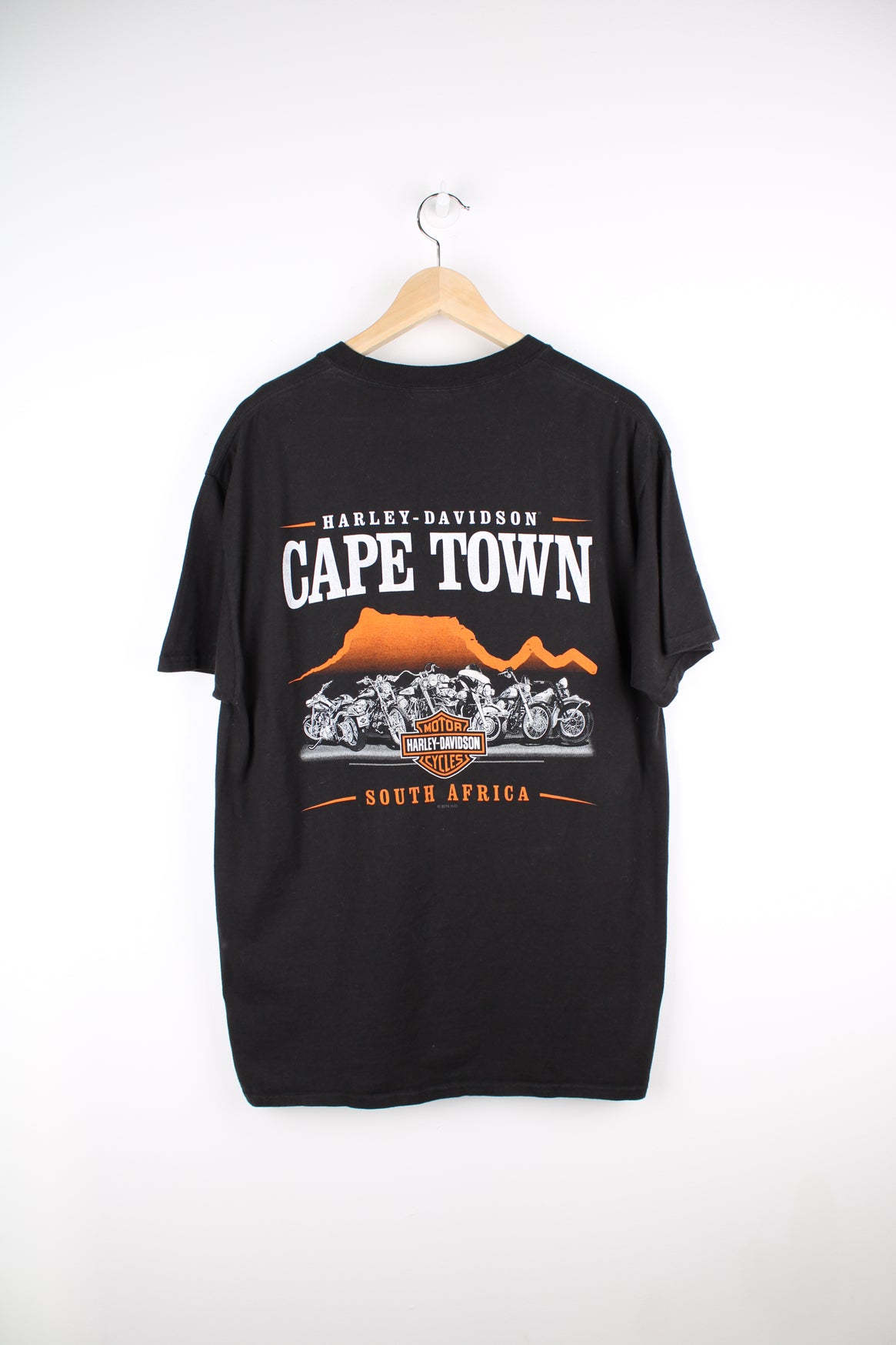 2016 Harley Davidson black t-shirt with "Bad Dog" design on the front and Cape Town design on the back. good condition Size in Label: Mens L- measures like M 