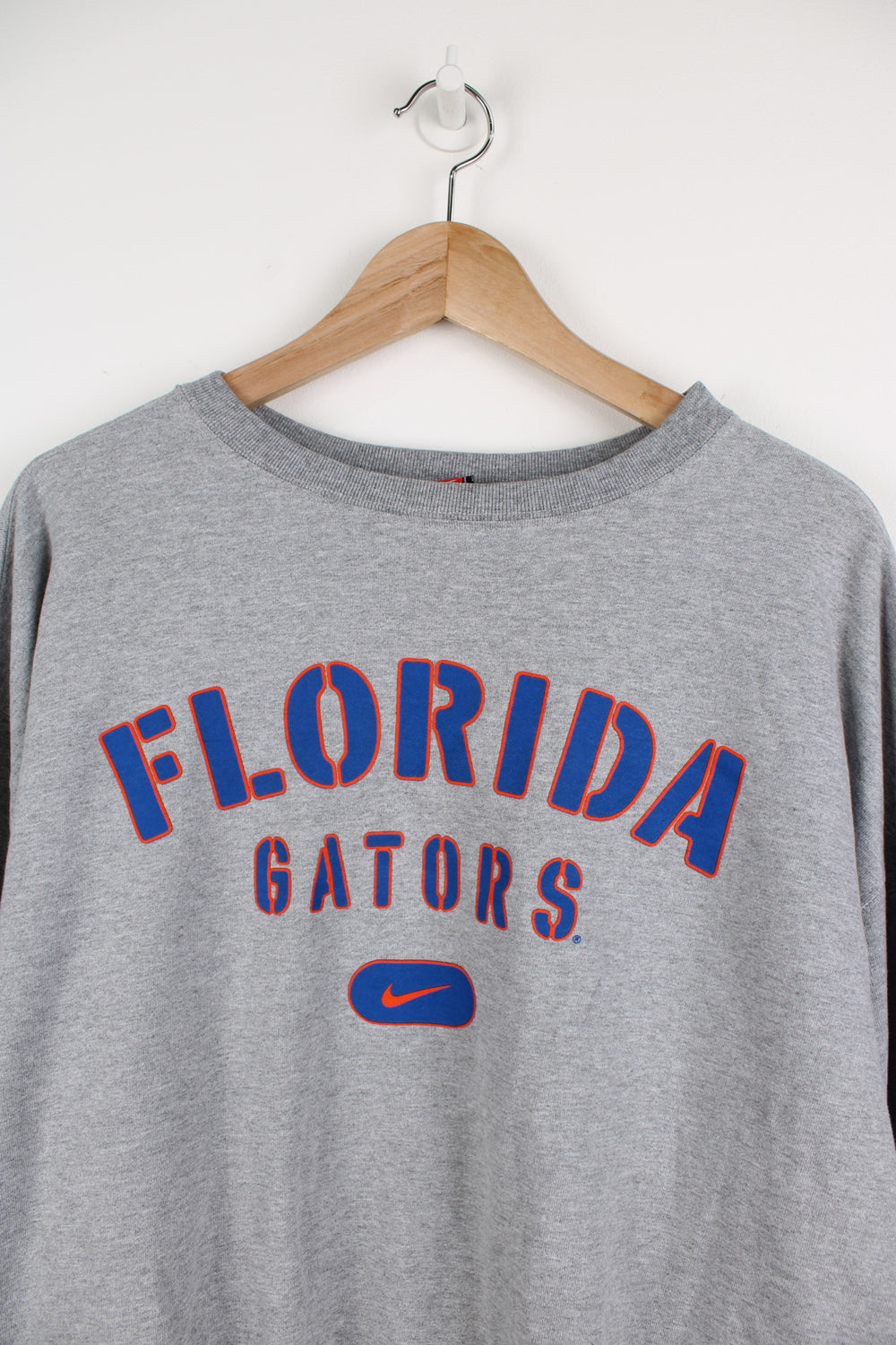 Vintage Florida Gators, grey crewneck sweatshirt by Nike. Features printed spell-out logo across the chest 