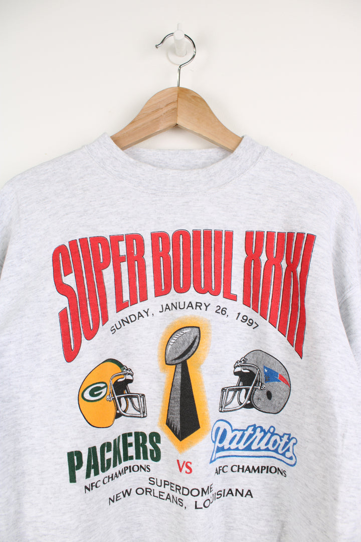 Vintage 1997 Packers vs Patriots Super Bowl grey crewneck sweatshirt with printed graphic on the front by Riddell 